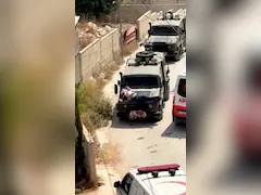 Israeli Forces Wound Palestinian, Tie Him On Top Of Vehicle And Drive Off