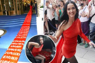 Katy Perry teases new song ‘Woman’s World’ in dress with 200-yard-long train featuring its lyrics