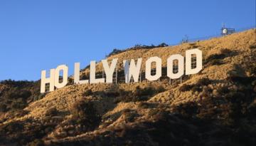 Hollywood workers union reaches pay, AI-use deal with top studios