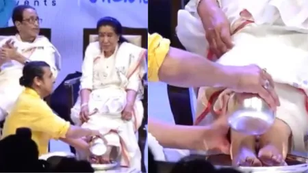 Sonu Nigam washes Asha Bhosle’s feet at her biography launch, netizens find it ‘quintessentially Indian’. Watch