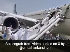 Watch: Fliers Slide Down Plane After Its Landing Gear Catches Fire In Pak