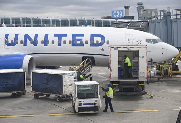 Stocks making the biggest moves after hours: United Airlines, Discover Financial Services, Kinder Morgan and more