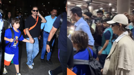 Shah Rukh Khan holds son AbRam’s hand, escorts Gauri Khan to the car as family return to Mumbai. Watch