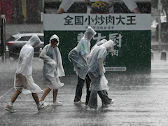 30 Killed, 35 Missing After Torrential Rains In China: Report