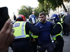 UK PM To Meet Cops Over Stabbing Attack As Protesters Chant "Save Our Kids"