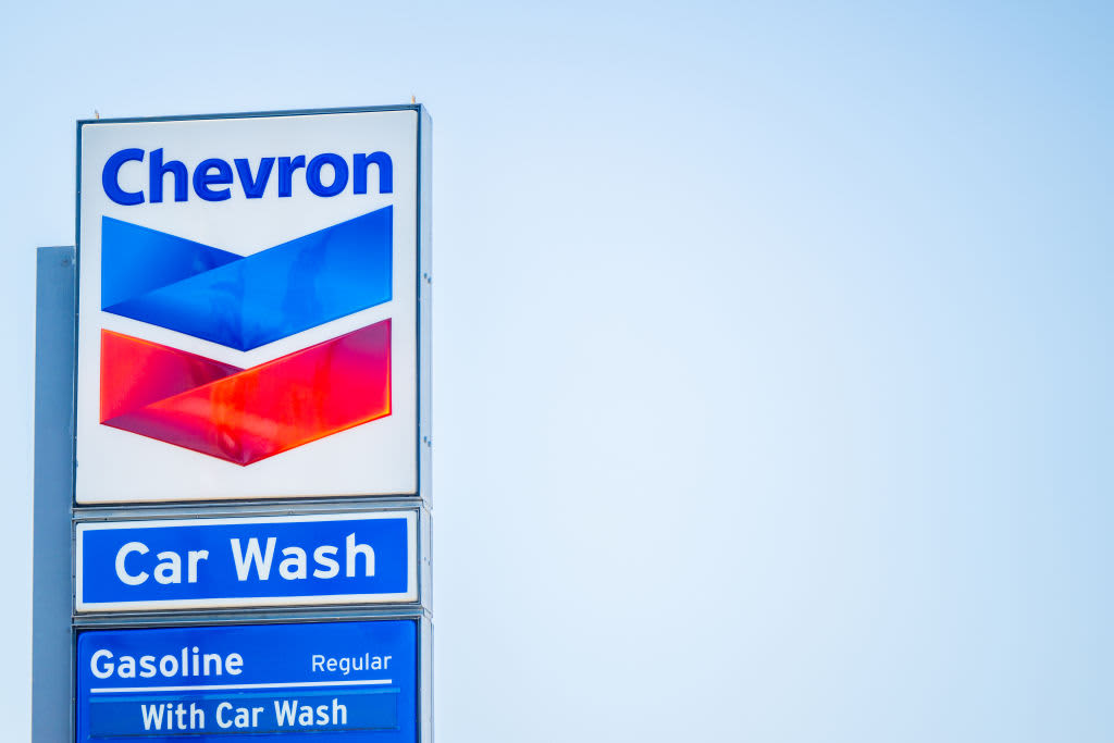 Stocks making the biggest moves midday: Chevron, Apple, Clorox, Amazon and more