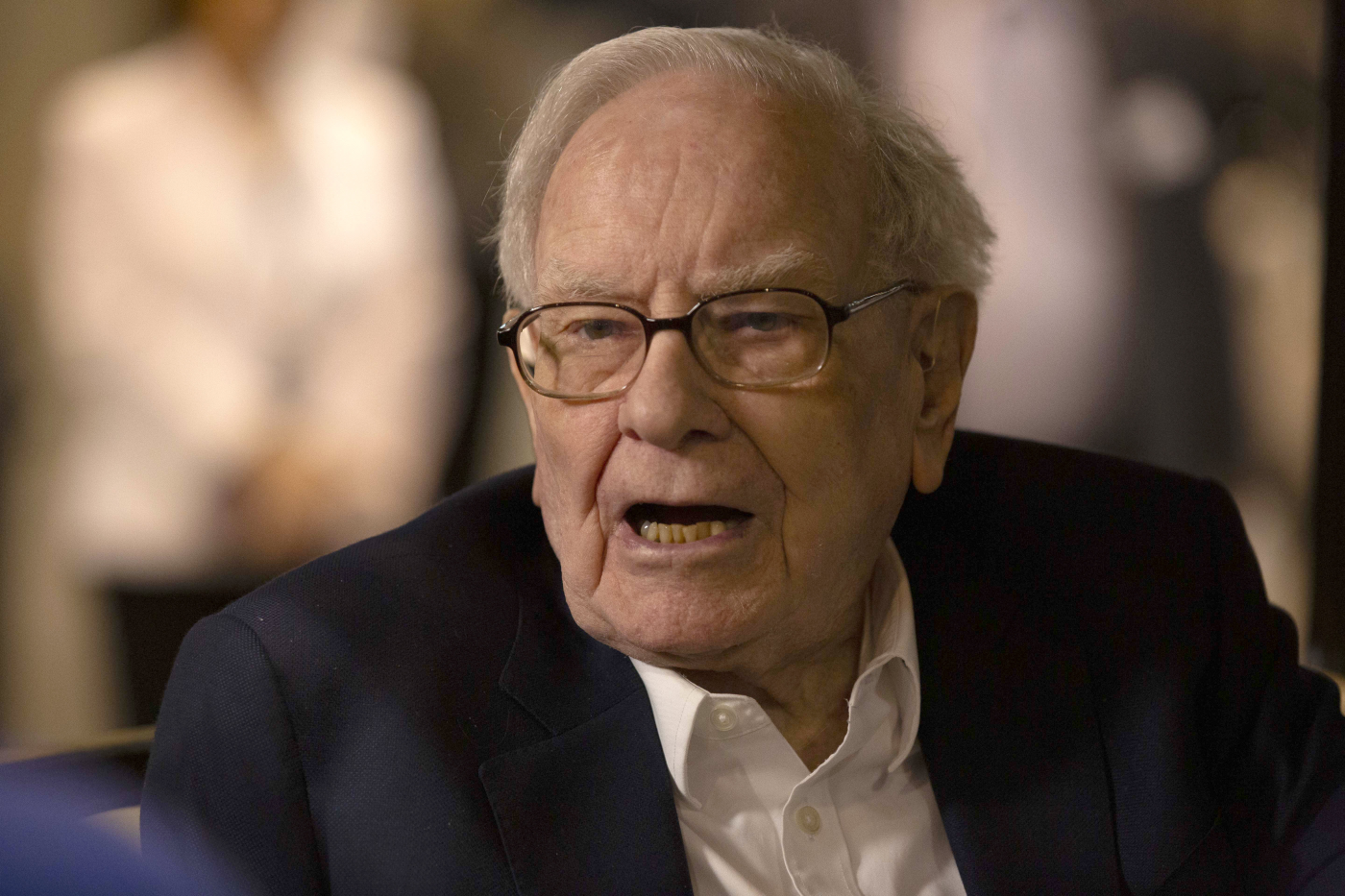 Apple shares drop 5% after Warren Buffett's Berkshire Hathaway slashes stake by half