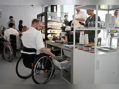 This Belarusian Wheelchair Barista Claims To "Make The World Better"