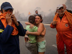 Residents Flee As Greece Wildfires Spread Despite "Superhuman" Efforts