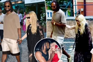 Madonna holds hands with rumored boyfriend Akeem Morris, 28, on Italian getaway just days before her 66th birthday