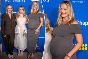 Margot Robbie shows off baby bump in first red carpet appearance since announcing pregnancy